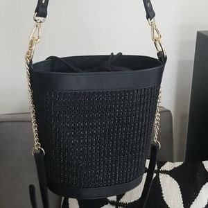 INC woven Bucket cross body bag.